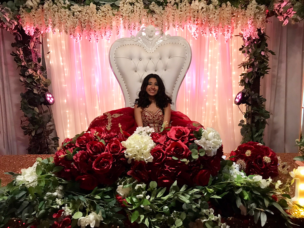 Sweetheart table styled in layered shades of red
