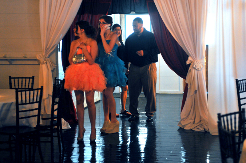 Prom attendees arriving and admiring the main ballroom.
