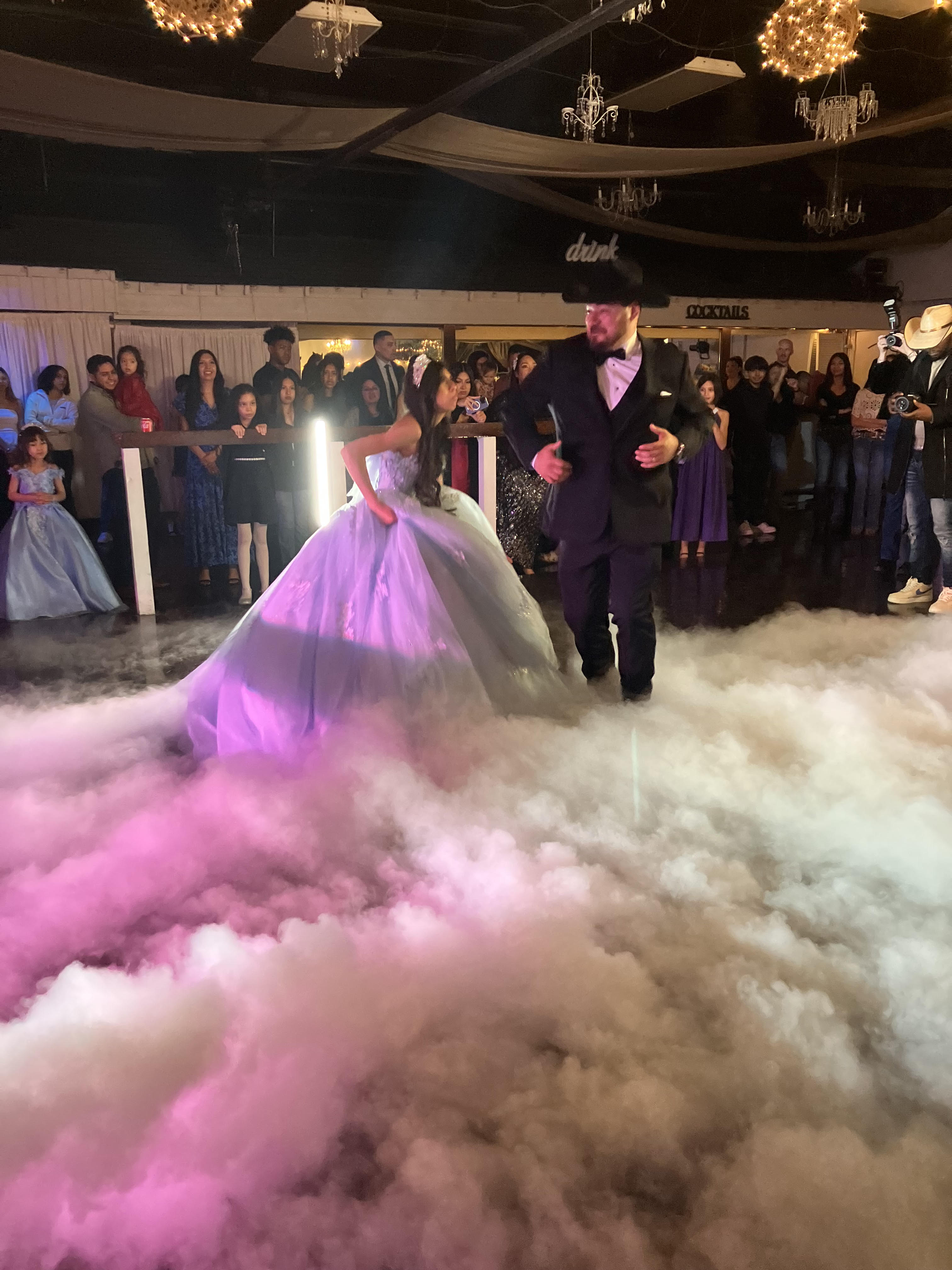 quinceanero dancers performing a choreographed dance