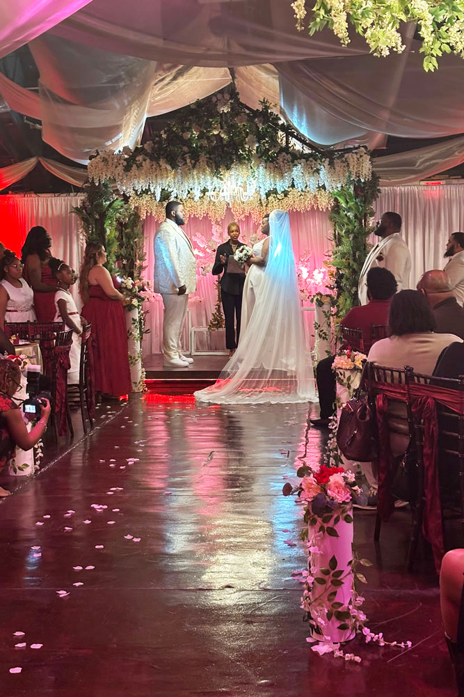 Bride and groom exchanging  vows.