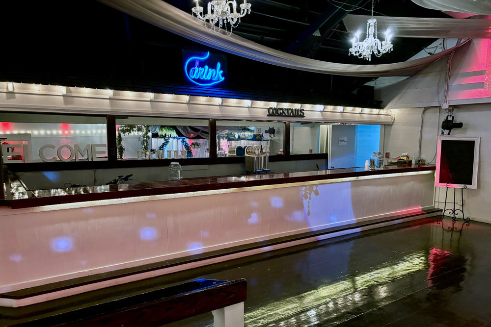 Fully staffed 30-foot bar ready for a wedding reception