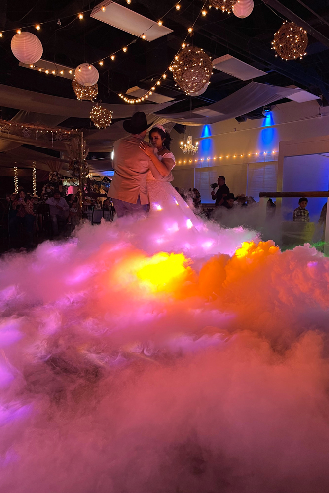 Guests dancing on a spacious, well-lit dance floor