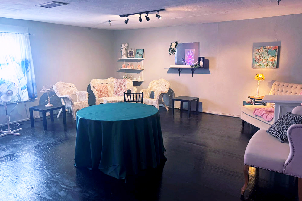 Spacious VIP changing room with lots of seating, mirrors, and soft lighting - perfect for getting ready for a special event