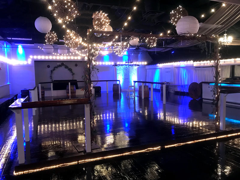 Dance floor with string lights and disco ball